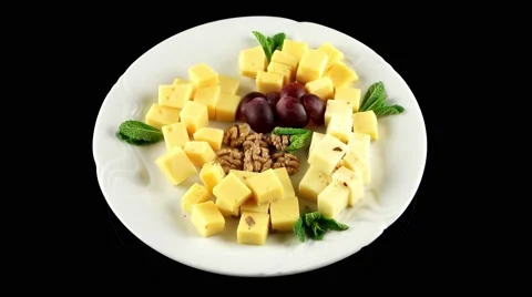 Cheese platter with different sort of organic fresh cheese, loop, top view Stock Footage 61707985