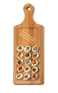 Cheese platter garnished Stock Photos