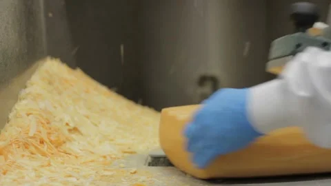 Cheese production factory Cheese Packaging Process. Close Up Of Cheese Stock Footage 336444396