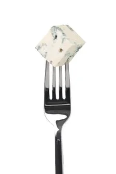 Cheese roquefort on a fork Stock Photos