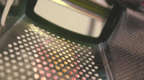Cheese rub on a grater bottom view slow motion Stock Footage 54142628