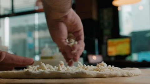 Cheese sauce on pizza dough medium shot Stock Footage 339843166