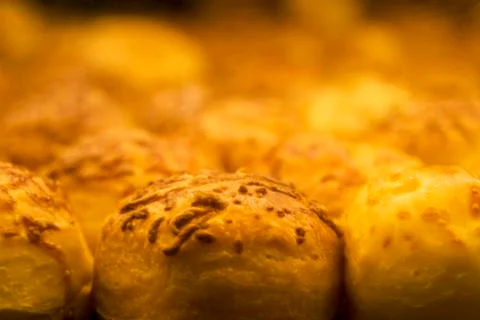Cheese scones macro view at the bakery. Stock Photos