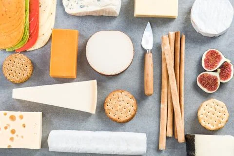 Cheese selection top view on stone slate Stock Photos