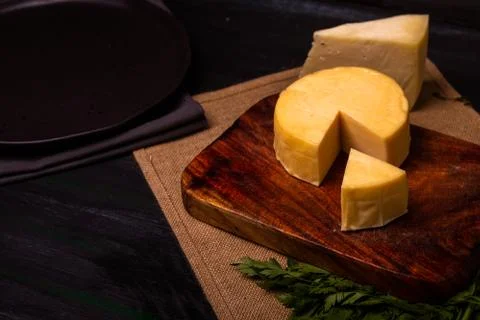 Cheese with serrano ham, olives on a table for a party with friends or as an  Stock Photos