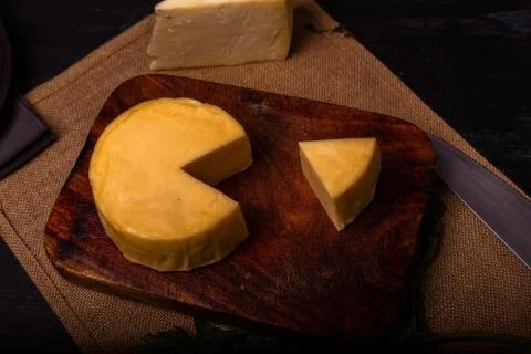 Cheese with serrano ham, olives on a table for a party with friends or as an  Stock Photos