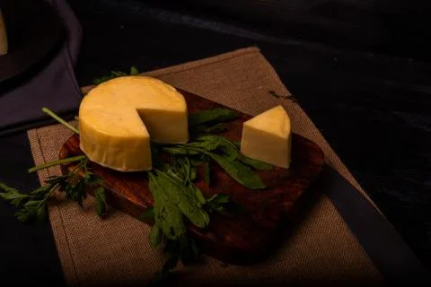 Cheese with serrano ham, olives on a table for a party with friends or as an  Stock Photos