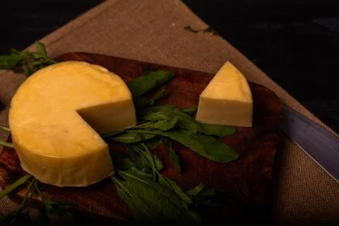 Cheese with serrano ham, olives on a table for a party with friends or as an  Stock Photos