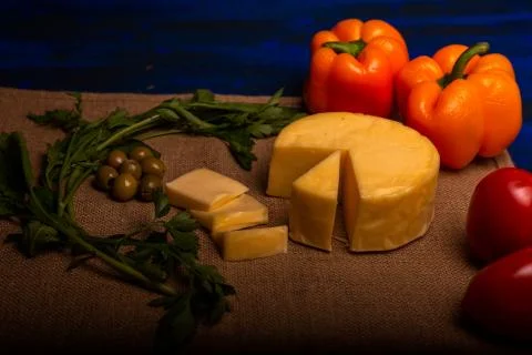 Cheese with serrano ham, olives on a table for a party with friends or as an  Stock Photos