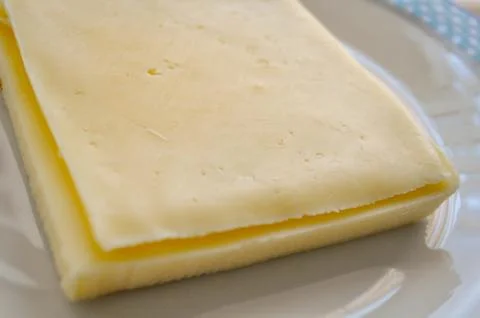 Cheese in sheets Stock Photos