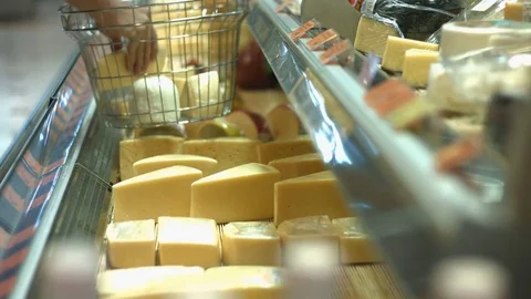Cheese on the shelf in the supermarket. Stockbeeldmateriaal 84178526