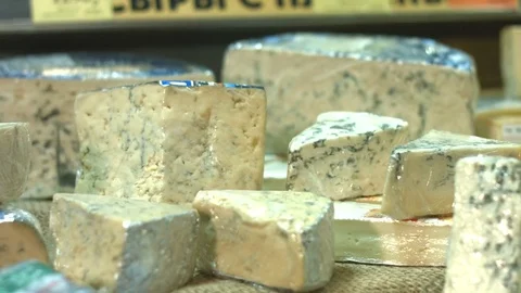 Cheese on the shelf in the supermarket. Stockbeeldmateriaal 84178554