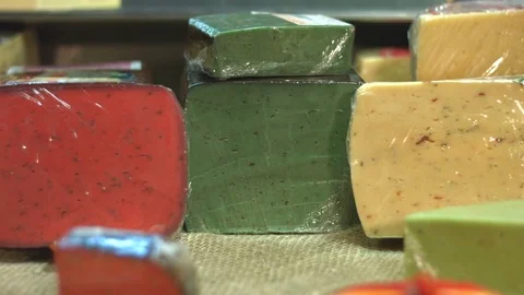 Cheese on the shelf in the supermarket. Video stock 84178649