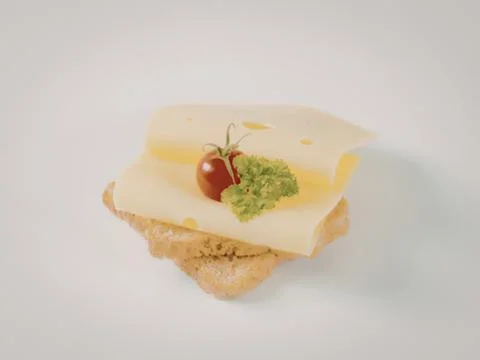 Cheese slice with cherry and parsley on bread Stock Photos