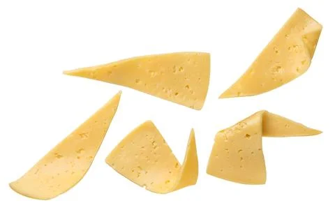 Cheese sliced flying, set on background. Isolated Stock Photos