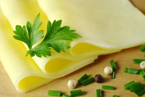 Cheese slices Stock Photos