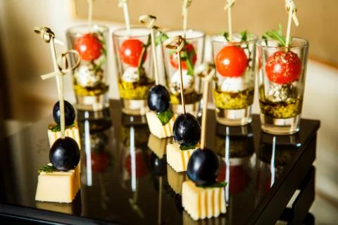 Cheese snack assorted served on brown table Foto stock