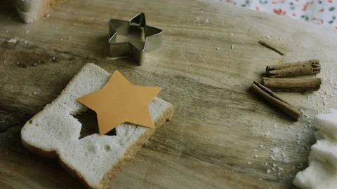 Cheese star centered over a matching bread cutout Stock Photos