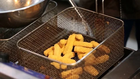 Cheese sticks fried in deep fat Stock Footage 72744158