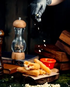 Cheese sticks on the table Stock Photos