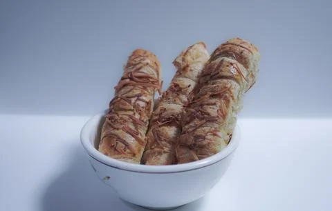 Cheese sticks on a white background. Stock Photos