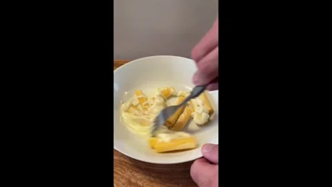 Cheese string coated in a crispy cheesy crumb Stock Footage 276493954