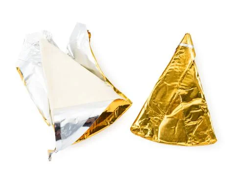 Cheese triangle in foil and opened on a white. The view of the top. Stock Photos