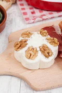 Cheese with walnuts Stock Photos