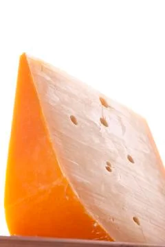 Cheese wedge vertical Stock Photos