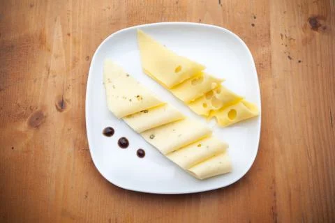 Cheese on white plate Foto stock