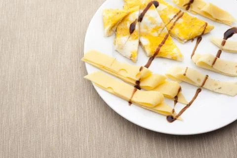 Cheese on white plate Foto stock