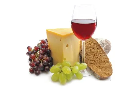 Cheese, wine, rustic bread and grapes as a cut out Stock Photos