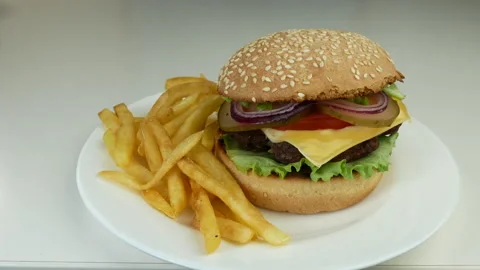 Cheeseburger and fries Stock Footage 241806691