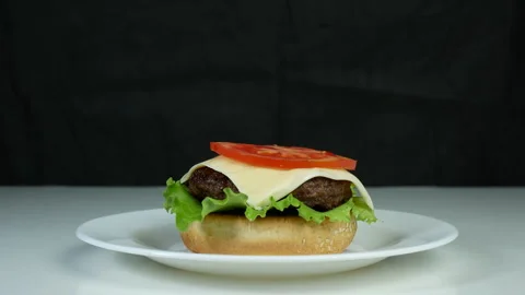 Cheeseburger cooking Stock Footage 241809091