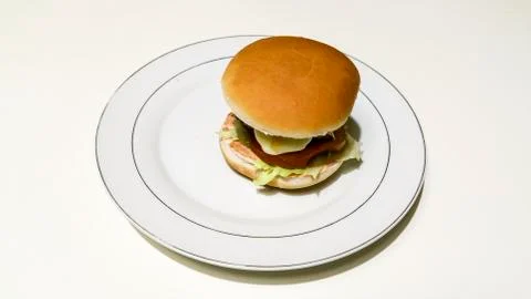 Cheeseburger on a plate Stock Photos