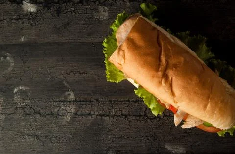 Cheeseburger on a wooden surface Foto stock