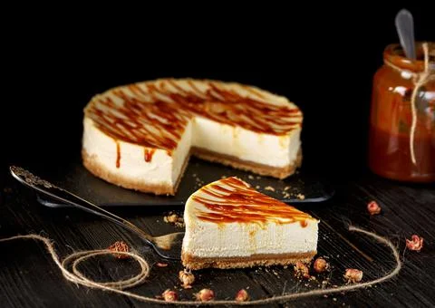 Cheesecake with caramel sauce. Stock Photos