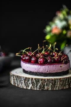 Cheesecake with cherries. Cherry cake on table Stock Photos