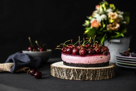 Cheesecake with cherries. Cherry cake on table Stock Photos