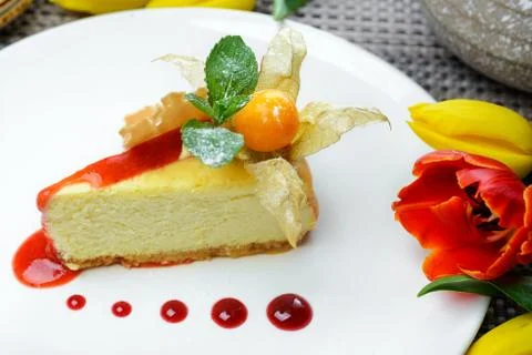 Cheesecake garnished physalis Stock Photos