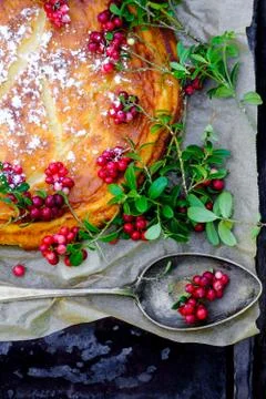 Cheesecake with lingonberries Stock Photos