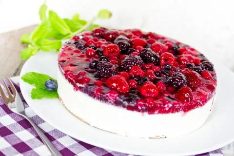 Cheesecake with mixed berries Stock Photos