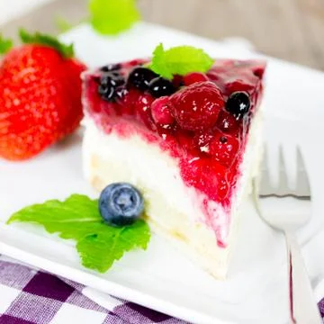 Cheesecake with mixed berries Stock Photos