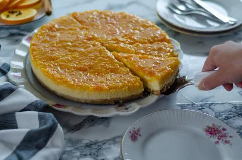 The cheesecake with orange. Stock Photos