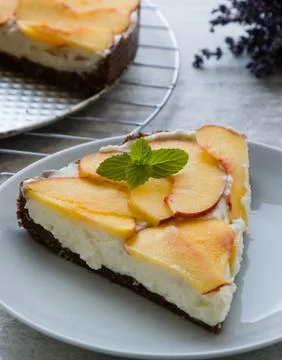 Cheesecake with peach Stock Photos