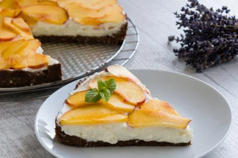 Cheesecake with peach Stock Photos