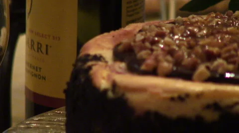 Cheesecake Rack Focus from Wine Bottle Stock-Footage 883319