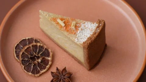 Cheesecake, a slice of sweet pie, a classic cheese dessert. Cheesecake as a food Stock Footage 321416114