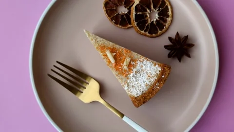 Cheesecake, a slice of sweet pie, a classic cheese dessert. Cheesecake as a food Stock Footage 321416366