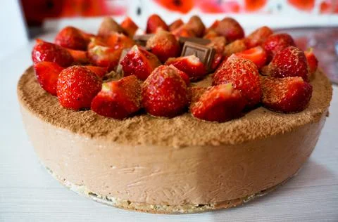 Cheesecake with strawberries on the table 写真素材